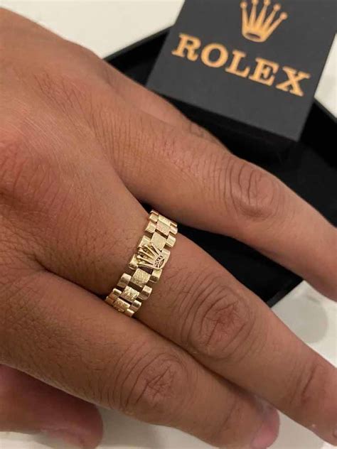 Anillo rolex oro 14k .